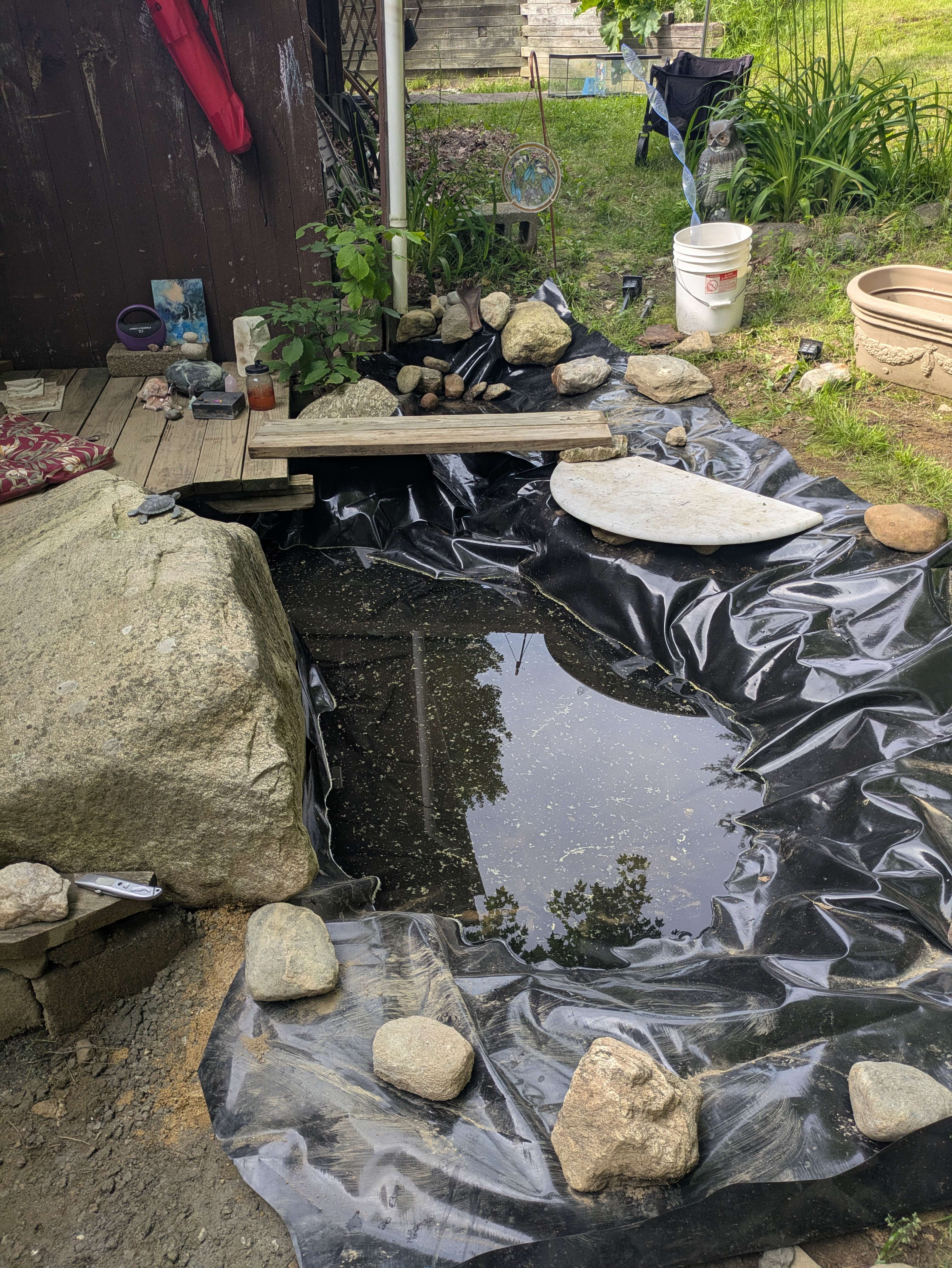 Water entering the newly lined pond