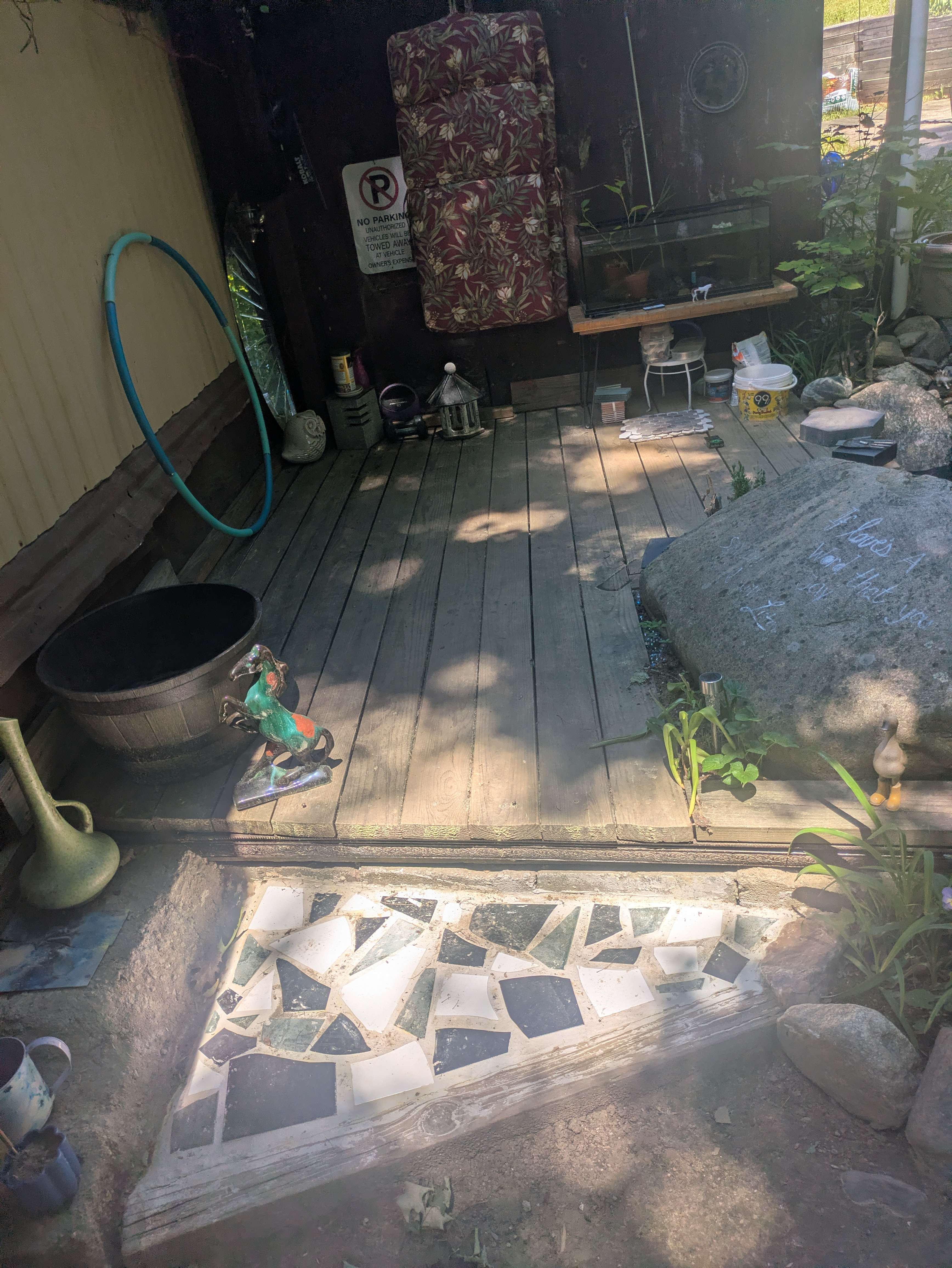 Stonework being arranged around the new water garden