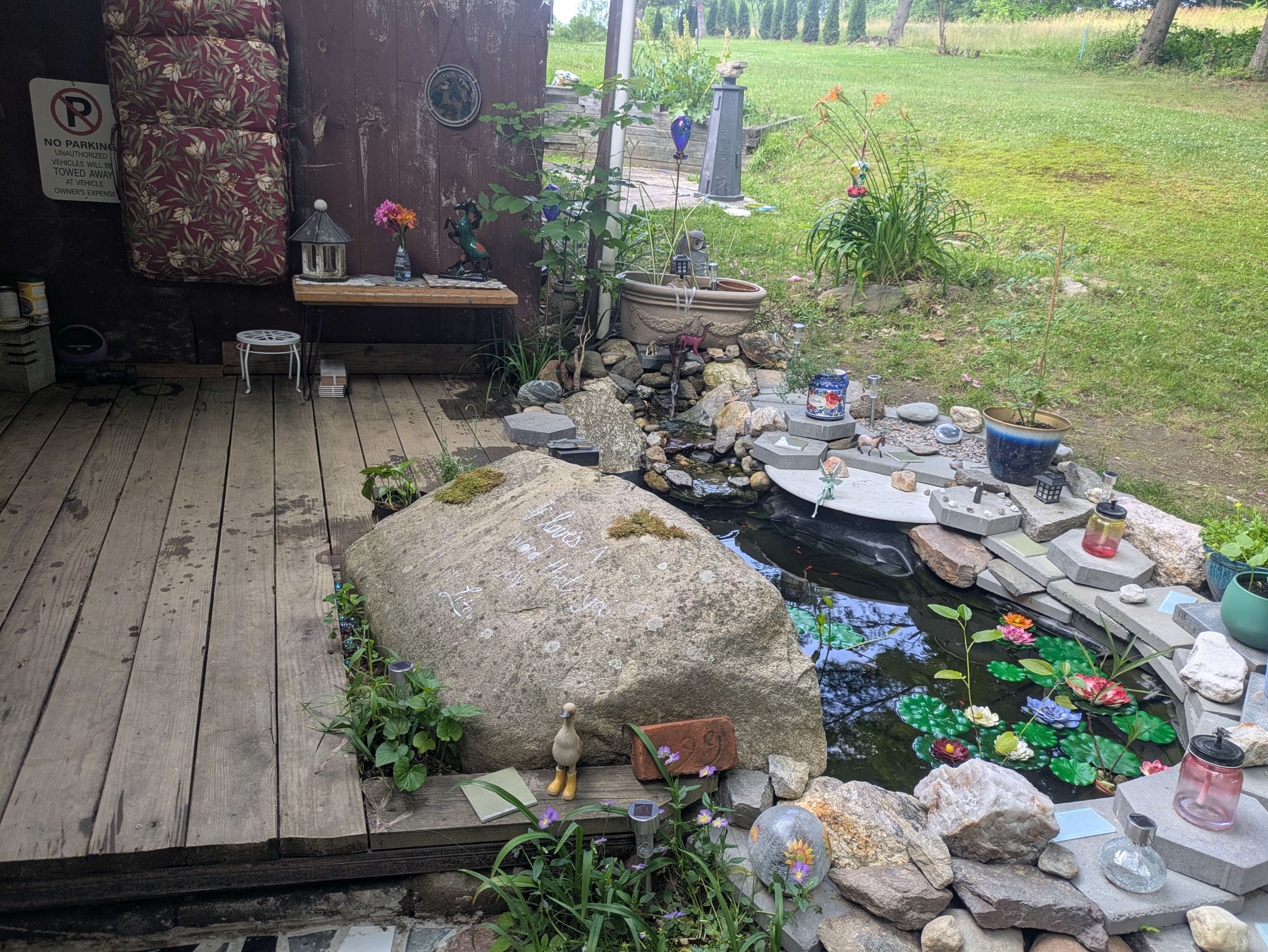 Planting around the edge of the water garden